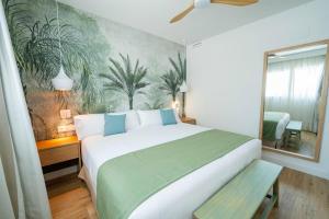 Cama o camas de una habitación en Punta Candor Suites