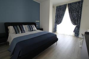 Postel nebo postele na pokoji v ubytování Villa Capodacqua