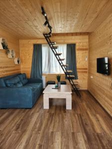 Posezení v ubytování Cottage Liantto