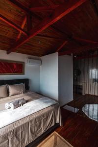 Postel nebo postele na pokoji v ubytování Pousada Dona Pedra - Cabana Jaspe + 21 fotografií