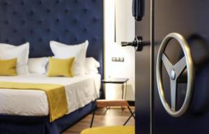 Postel nebo postele na pokoji v ubytování Design Plus Bex Hotel