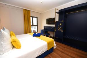 Postel nebo postele na pokoji v ubytování Design Plus Bex Hotel