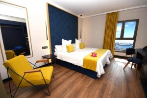 Postel nebo postele na pokoji v ubytování Design Plus Bex Hotel