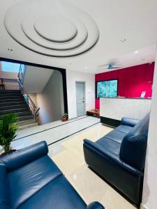 Χώρος καθιστικού στο Hotel Midtown Begumpet