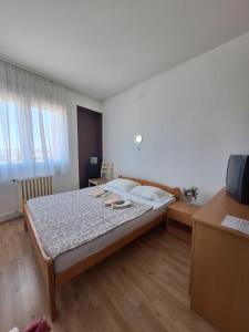 Postelja oz. postelje v sobi nastanitve Hotel Konaciste Trstenik