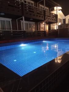 Bazén v ubytování Satva Cottages nebo v jeho okolí