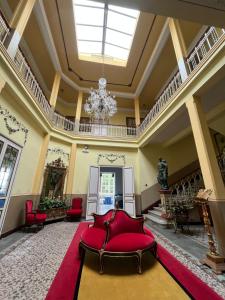 Ein Sitzbereich in der Unterkunft Hotel Palacete Peñalba