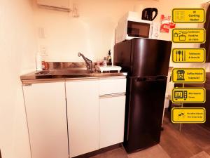 Cucina o angolo cottura di Necoana Glamping富士山景BBQトレーラーヴィラ