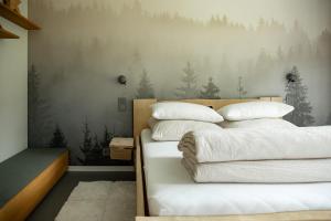 Loder Lodge tesisinde bir odada yatak veya yataklar