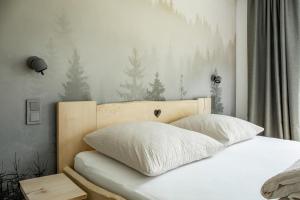 Loder Lodge tesisinde bir odada yatak veya yataklar