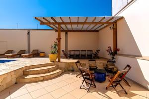 Hồ bơi trong/gần Guest House Iguatemi Campinas - Casa Perfeita
