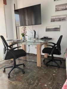 TV a/nebo společenská místnost v ubytování Lovely studio Cartago