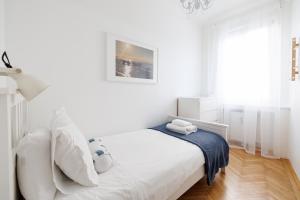 Posteľ alebo postele v izbe v ubytovaní Operastreet City Center Apartment Algarve