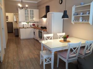 A kitchen or kitchenette at Julija & Filip Apartments