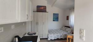 Postel nebo postele na pokoji v ubytování Tijana Apartments