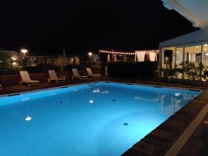 Bazén v ubytování Hotel Benini nebo v jeho okolí