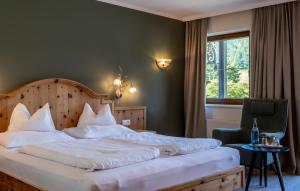 Voodi või voodid majutusasutuse Hotel der Wiesenhof toas