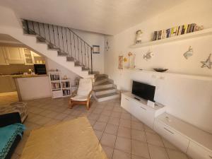 Kuchyň nebo kuchyňský kout v ubytování VILLA TRAMONTI SUL MARE