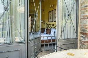 Postel nebo postele na pokoji v ubytování Residenza Il Colle