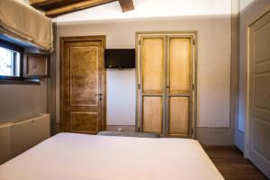 Postel nebo postele na pokoji v ubytování Residenza Il Colle
