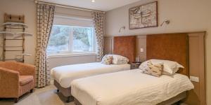 Voodi või voodid majutusasutuse The Mallard Hotel toas