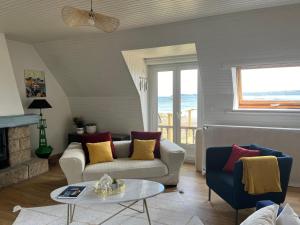 Posezení v ubytování Au bord de la mer