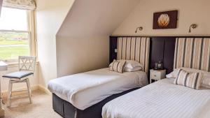 Voodi või voodid majutusasutuse The Mallard Hotel toas