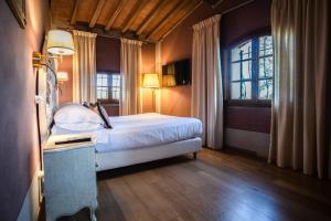Postel nebo postele na pokoji v ubytování Residenza Il Colle