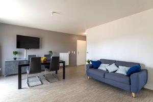 TV a/nebo společenská místnost v ubytování Appartement du Blanchet très agréable