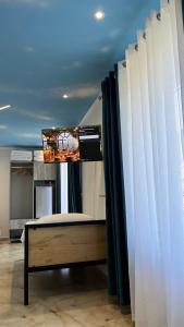 Зображення з фотогалереї помешкання Hotel Davids у місті Koman