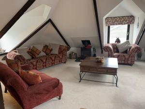 พื้นที่นั่งเล่นของ Stunning 4 Bed Pet Friendly Cottage with Hot Tub