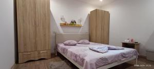 Postel nebo postele na pokoji v ubytování Casa MILLY Constanta