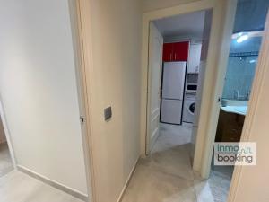 A kitchen or kitchenette at InmoBooking LeriMar
