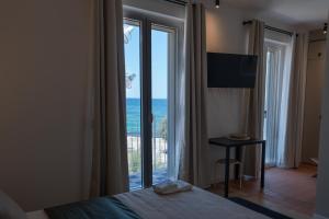 Μια τηλεόραση ή/και κέντρο ψυχαγωγίας στο Leluan Bed and Breakfast