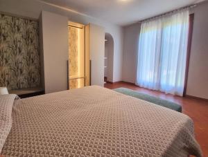 A bed or beds in a room at Villa Selva