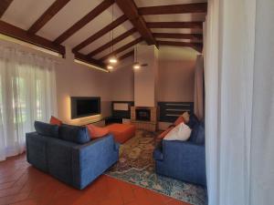 A television and/or entertainment centre at Villa Selva