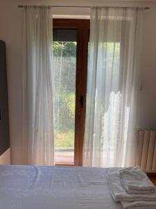 A bed or beds in a room at Apartman Djordjevići