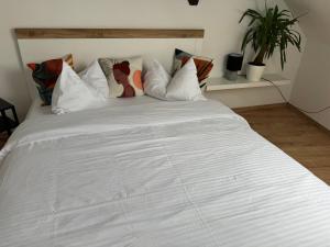 Postel nebo postele na pokoji v ubytování Wohlfühl-Oase in der Altstadt