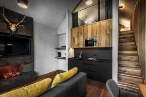 A kitchen or kitchenette at Sportony Mountain Lodges