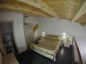 Postelja oz. postelje v sobi nastanitve Mini Loft