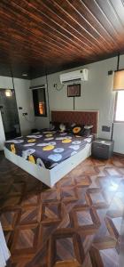 a bedroom with a large bed in a room at Skyview Villa Udaipur with private pool 4Bhk Villa in Udaipur