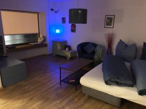TV i/ili multimedijalni sistem u objektu Kapellenblick! geräumiges Apartment