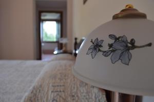 A bed or beds in a room at Colle Del Barbarossa