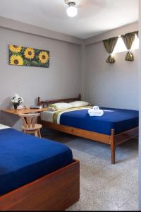 Postel nebo postele na pokoji v ubytování Casa Betancourt Salinas