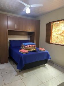 Ένα ή περισσότερα κρεβάτια σε δωμάτιο στο Casa de campo