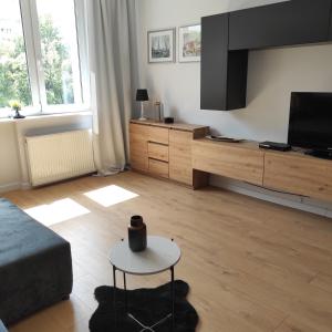 Televízia a/alebo spoločenská miestnosť v ubytovaní Apartament MORSKA 148 Gdynia 65m2