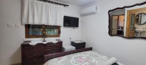 TV a/nebo společenská místnost v ubytování Guest House Emily