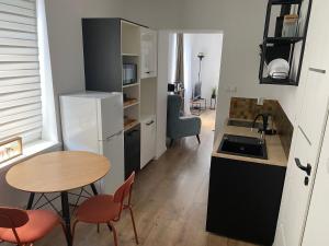 Kuchyň nebo kuchyňský kout v ubytování Apart Rembricz