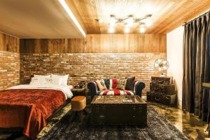 Ένα ή περισσότερα κρεβάτια σε δωμάτιο στο Bellino Hotel