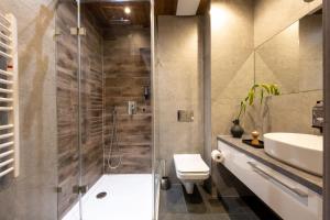 Kúpeľňa v ubytovaní Apartamenty Krupówki 20 + 20 fotografií
